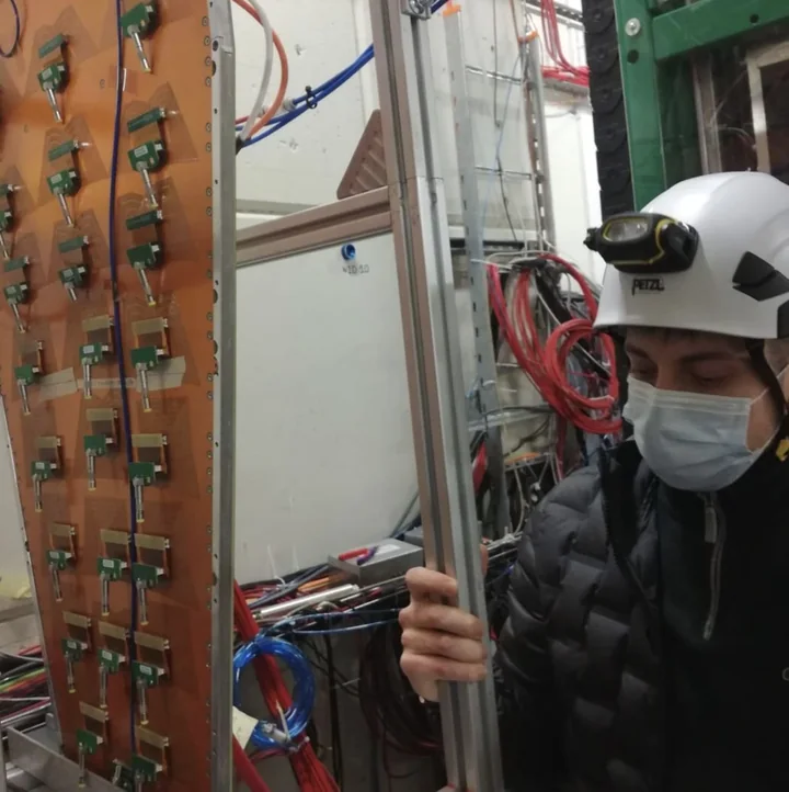 Davide working beside a GEM chamber at the irradiation test facility